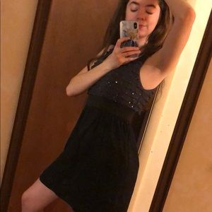 This is a fun, dark, dress, with a spandex divider